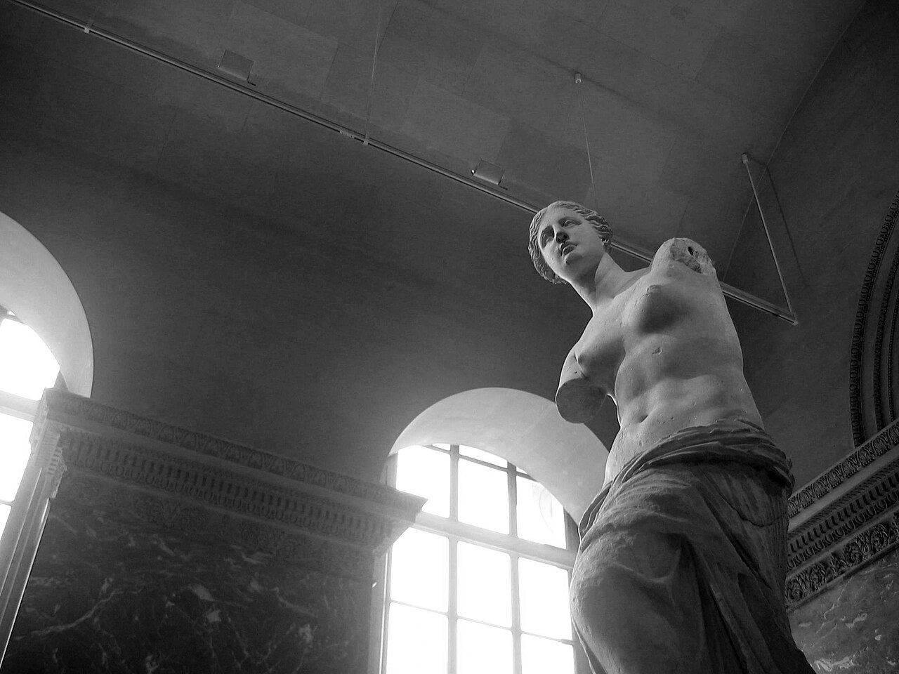 The ancient Greek sculpture Venus de Milo displayed in the Louvre Museum Paris